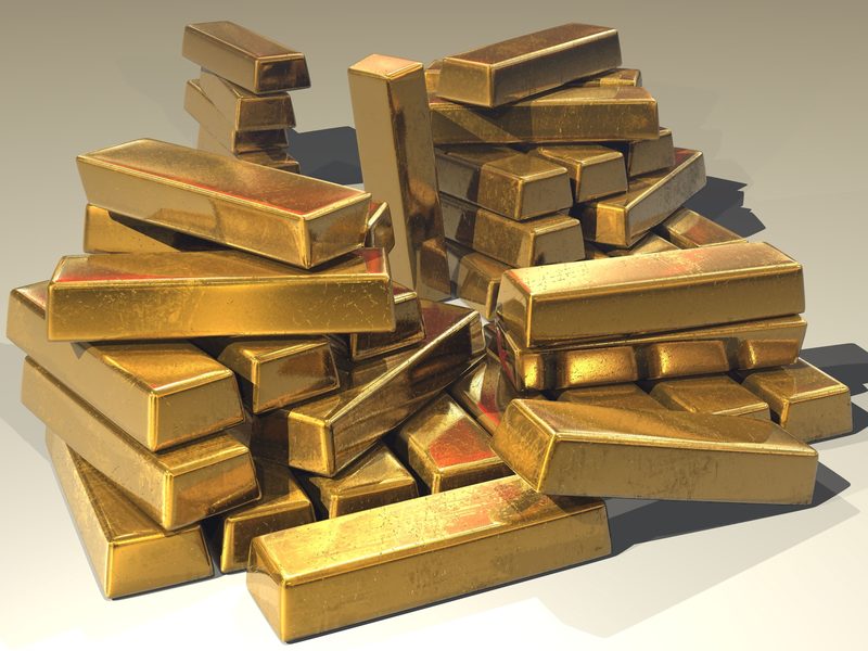 Stacked fine gold bars